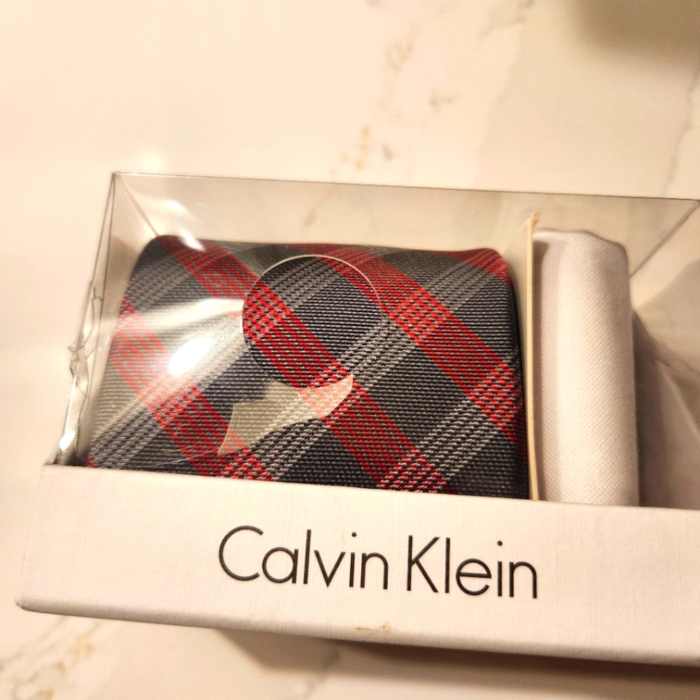 Calvin Klein brand new tie and handkerchief in box.